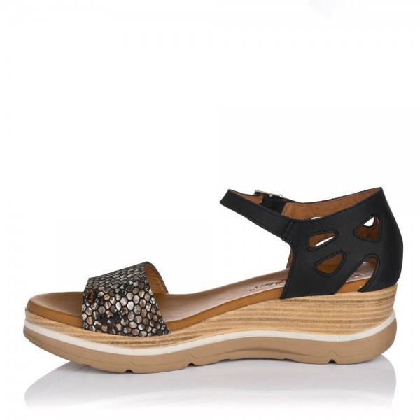 Sandalias con cuna y plataforma de 25 cm con talon cerrado de mujer  fabricadas en piel de primera calidad de la firma Paula Ur